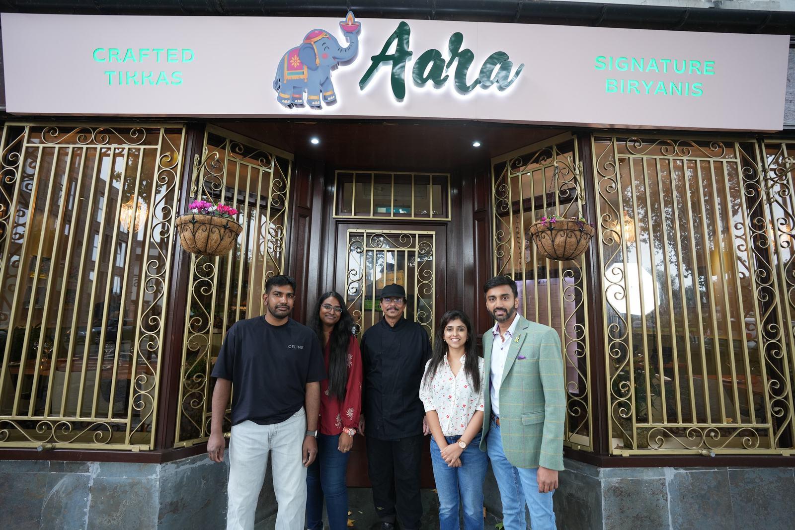 The Aara team gathered at the restaurant entrance